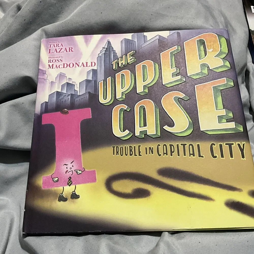 THE UPPER CASE TROUBLE IN CAPITAL CITY HARDCOVER W/ DUST COVER 1ST ED. 2019 NEW